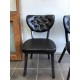Scaun tapitat dining/bucatarie, Lincoln Negru, material Piele ecologica, cadru Lemn, picioare metal negru Scaun tapitat dining/bucatarie, Lincoln Negru, material Piele ecologica, cadru Lemn, picioare metal negru